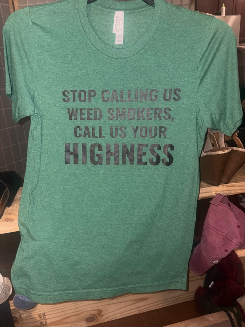 Bella Canvas Green Short Sleeve Tee with Black Text "HIGHNESS"
